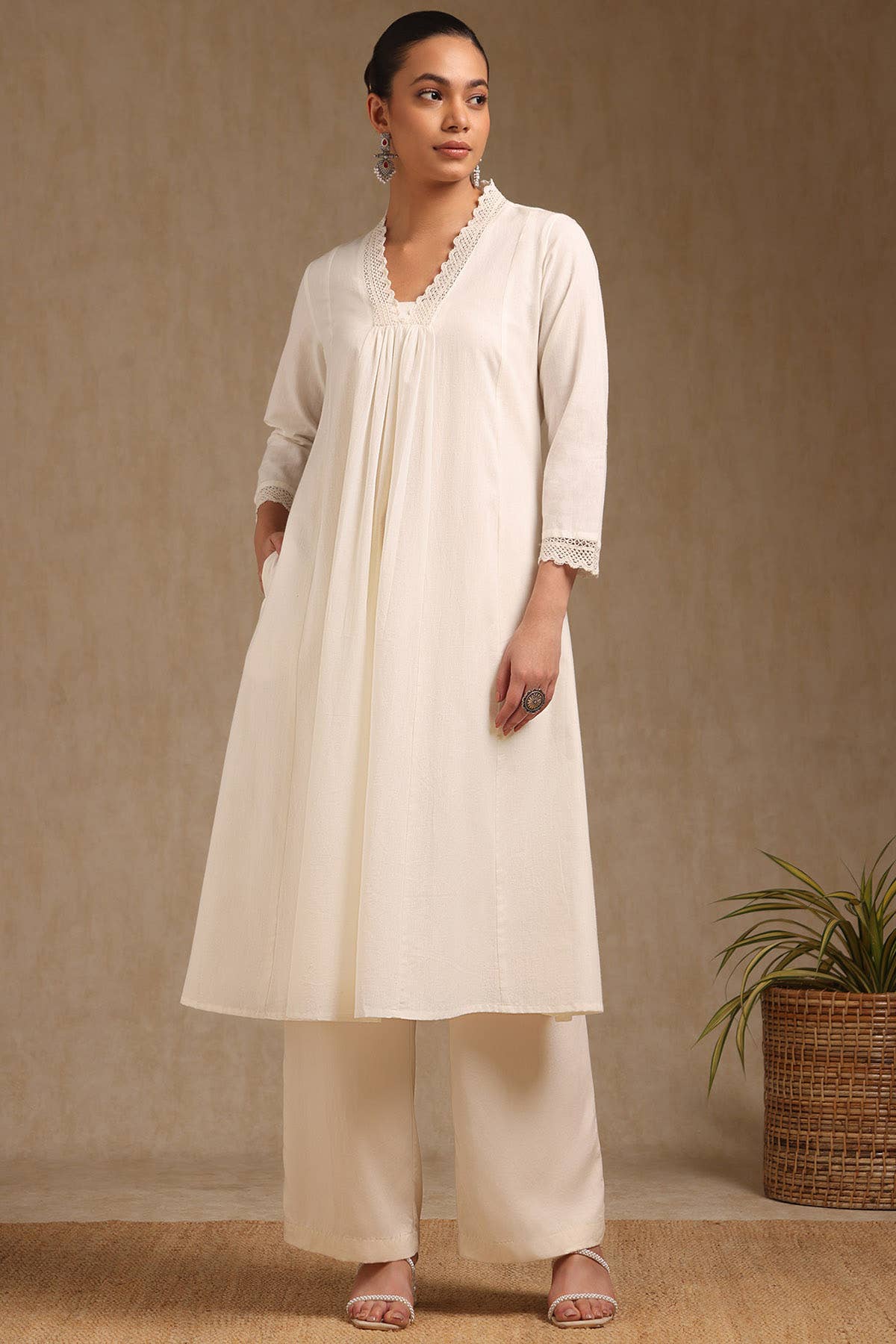 Off White Cotton Solid V-Neck Lace Inserts A-Line Kurta With Front Pleats - View 2